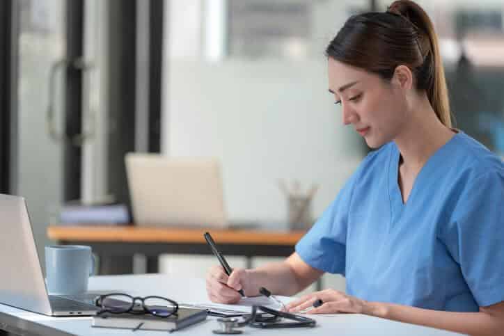 A clinical researcher collating results of random sampling test after clinical research training