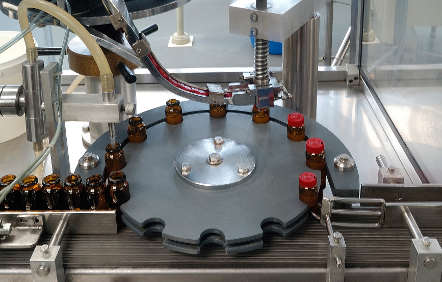 Pharmaceutical quality assurance professionals evaluate each step of the production process