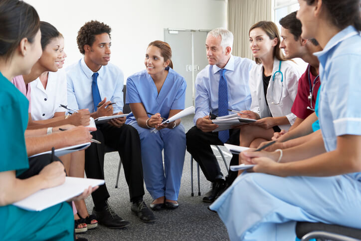 Young regulatory affairs training grads sitting in an office