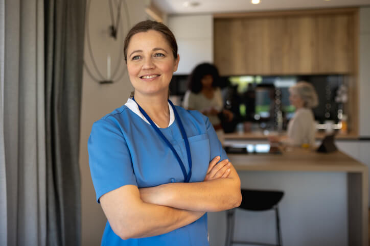 A smiling female personal support worker