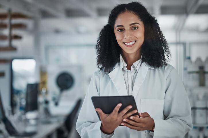 A female laboratory technician in a laboratory after completing her pharma QA training