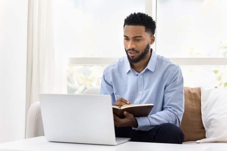 A male quality assurance professional attending an online pharmaceutical training program