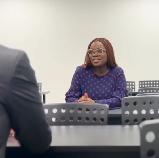 A clinical research training student Tolulope Adegbite, with an instructor at AAPS