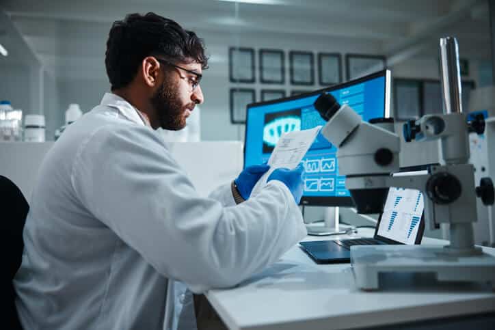 A Pharma QA professional reviewing chromatograms for data integrity